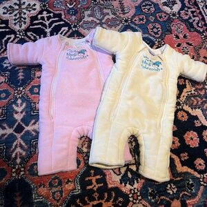 Baby Merlin Magic Sleepsuits small (yellow) and large (pink)